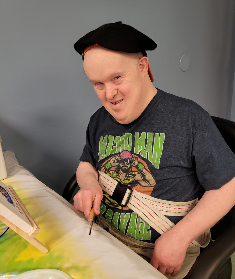 Individual enjoying painting activity