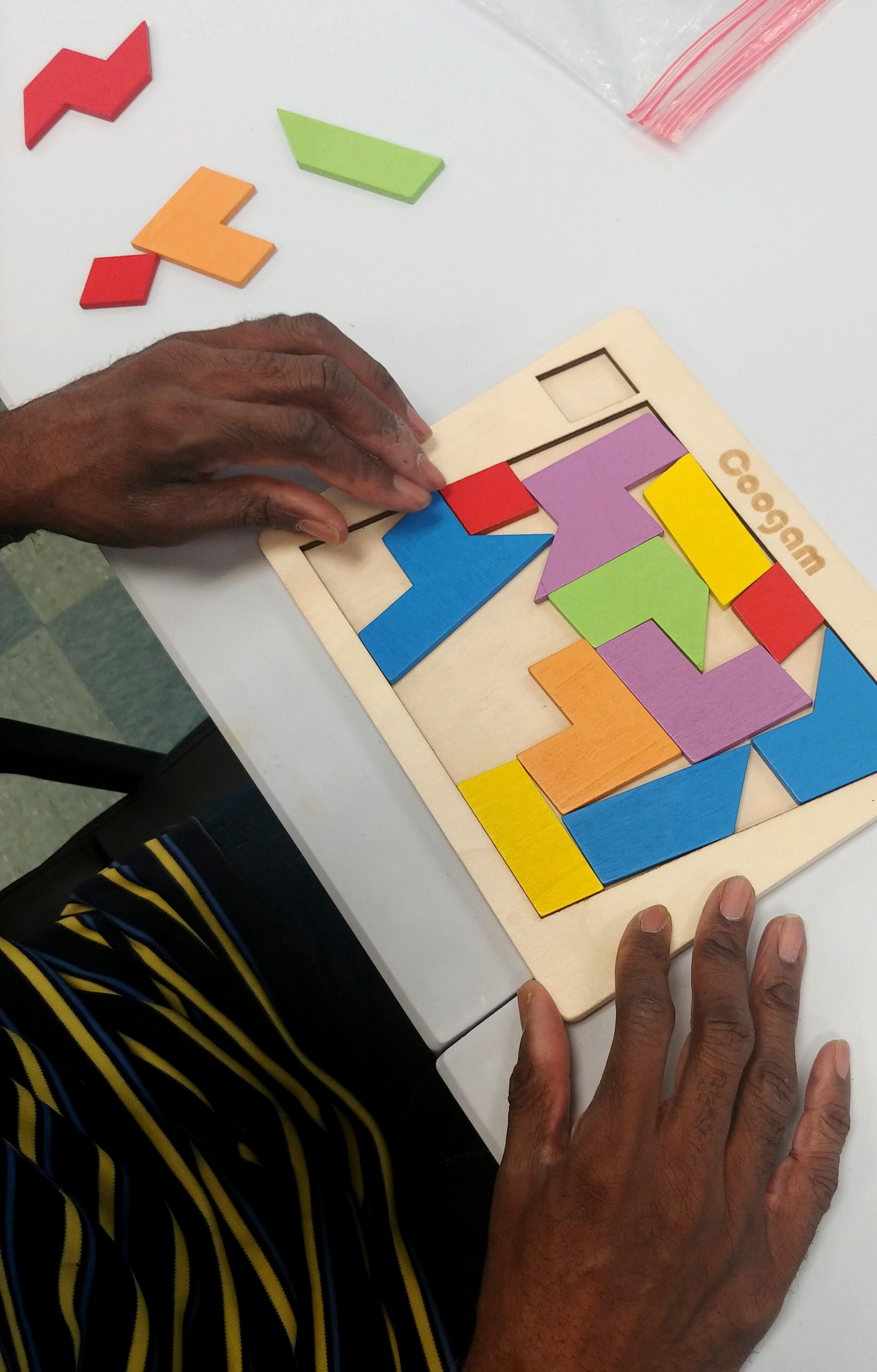 Individual working on a puzzle